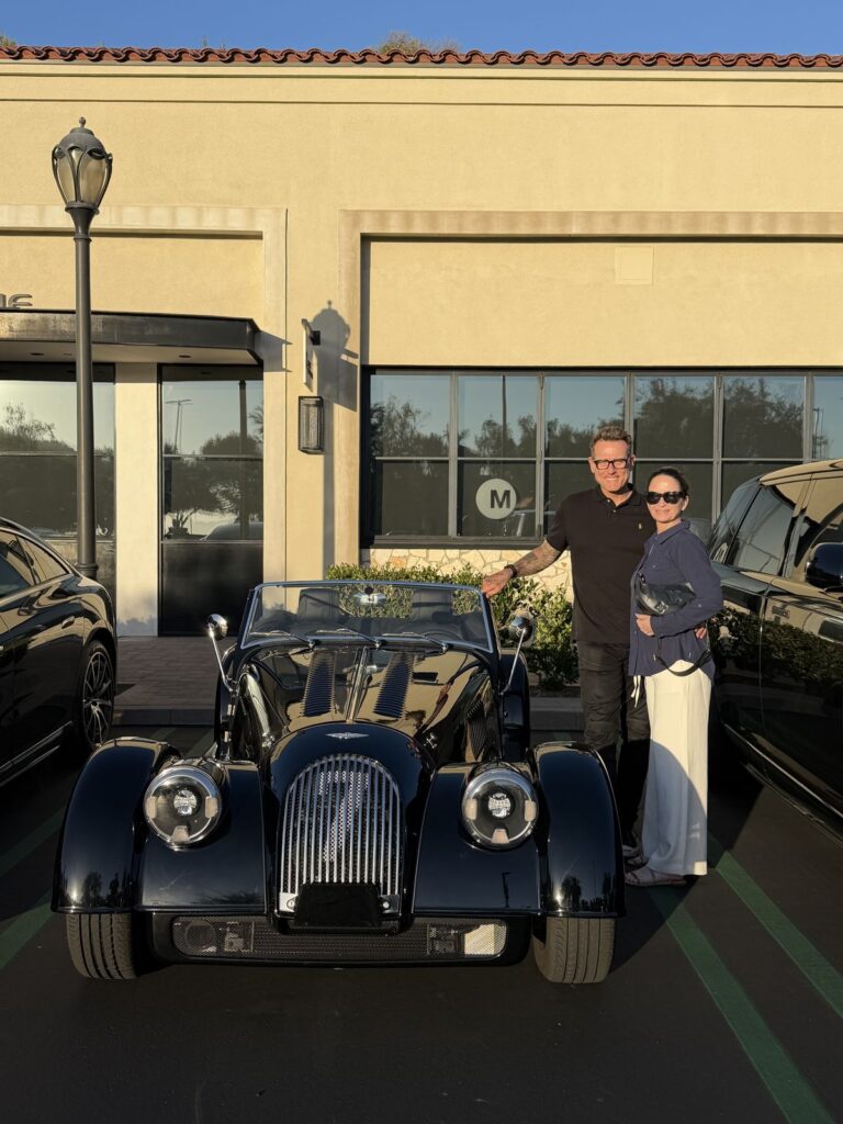 Noah and Chantel with Audrey, the custom-built Morgan Motor Plus Four