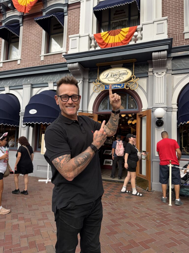Noah Elias outside Disneyana on Main Street at Disneyland