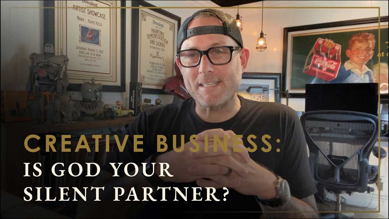 Noah Elias in his studio discussing creative business