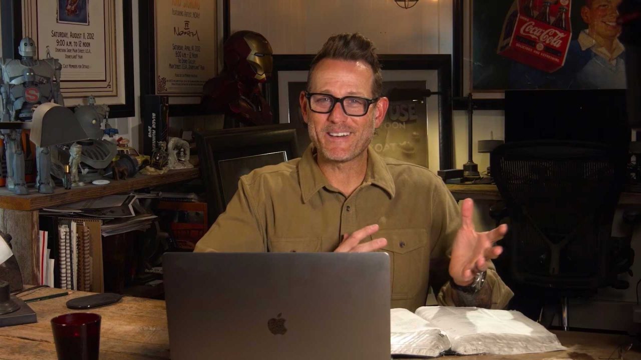 Noah Elias in his studio on his laptop